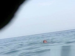 Naked and showing everything at the nude beach