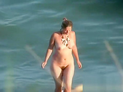 Naked and showing everything at the nude beach