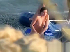 Naked and showing everything at the nude beach