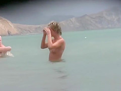 Naked and showing everything at the nude beach