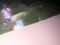 Nude Tanya playing frisbee on the beach