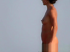 Sexy beach nudists got on voyeur cam with natural bodies