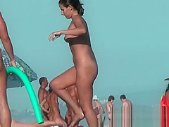 Nudist beach voyeur vid with two gorgeous brunettes all nake