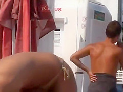 Big saggy tits brunette at the beach