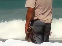 Big saggy tits brunette at the beach