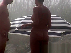 A beach voyeur video of a splendid female body a nudist