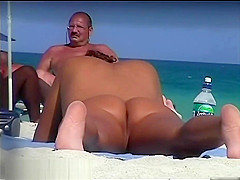 Naked tanned pussies acting horny at the beach
