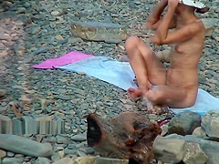 Nudist girls expose bodies at the beach