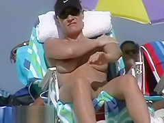 Couple split by Strangers on a nude beach