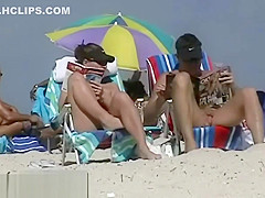 Couple split by Strangers on a nude beach