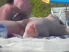 Voyeur can't believe how many chicks are on the nudist beach