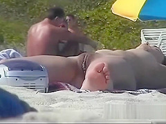 Voyeur can't believe how many chicks are on the nudist beach