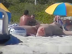 Voyeur can't believe how many chicks are on the nudist beach