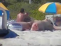 Voyeur can't believe how many chicks are on the nudist beach