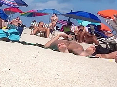 Beautiful Latina showing her pussy on nude beach