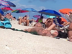 Beautiful Latina showing her pussy on nude beach