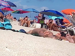 Beautiful Latina showing her pussy on nude beach