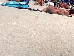 Beautiful Latina showing her pussy on nude beach