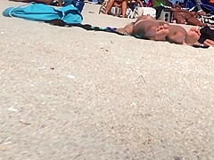 Beautiful Latina showing her pussy on nude beach