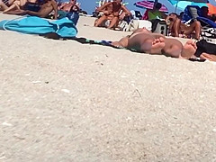 Beautiful Latina showing her pussy on nude beach