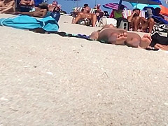 Beautiful Latina showing her pussy on nude beach