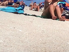 Beautiful Latina showing her pussy on nude beach