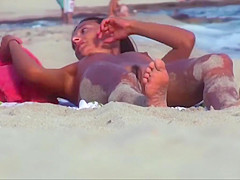 Milf with hairy pussies on the beach close-up
