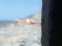 Nude couple on the beach