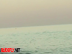 Milf Filmed At A Nudist Beach While Taking Off Her Top. Nice