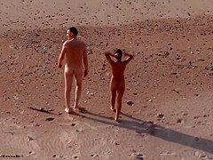 Spying on a horny couple fucking on the beach