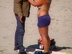 German milf on french beach spy. Shaky quality.