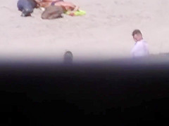 German milf on french beach spy. Shaky quality.