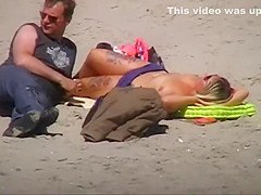 German milf on french beach spy. Shaky quality.
