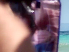 Topless brunette friends with nice tits on the beach