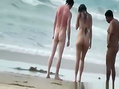 Two nudist friends with pierced nipples