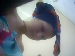 Peeping a hairy pussy and a firm ass