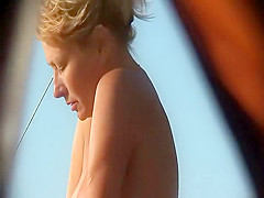 Sideways view of a nicely trimmed pussy