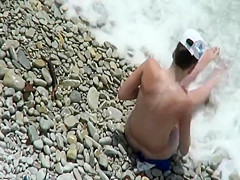 Naked girl with stones on her nipples
