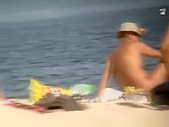 Nudist woman smile on her butt