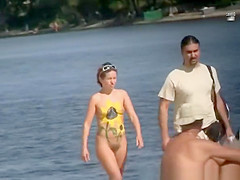 Nudist woman smile on her butt