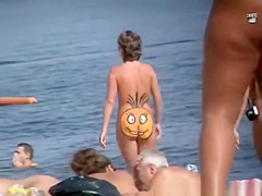 Nudist woman smile on her butt