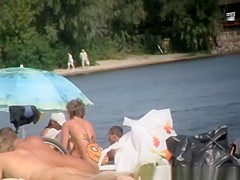 Nudist woman smile on her butt