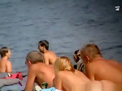 Nudist woman smile on her butt