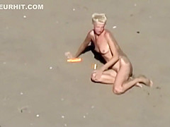 Dirty nudist girl on the beach