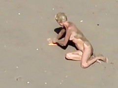 Dirty nudist girl on the beach