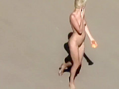 Dirty nudist girl on the beach