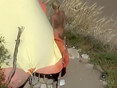 Dirty nudist girl on the beach