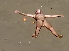 Dirty nudist girl on the beach