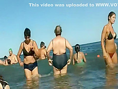 Perfect girl steps out of the water