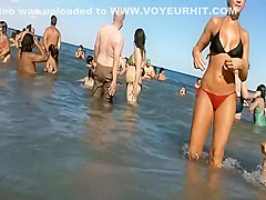 Perfect girl steps out of the water